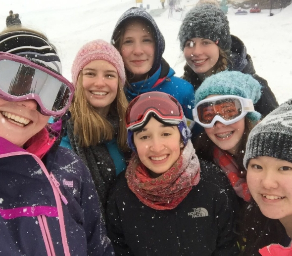 Friends skiing in Canada