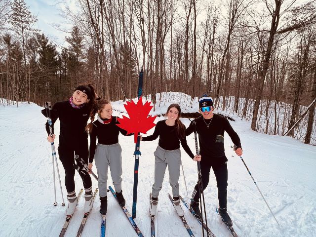 Friends skiing in Canada